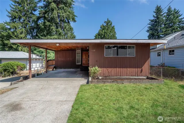 The Durden home offers an extraordinary opportunity. This Mid Century rambler with a basement is over 2600 sq ft with room to expand and to build, multiplying your equity each step of the way.