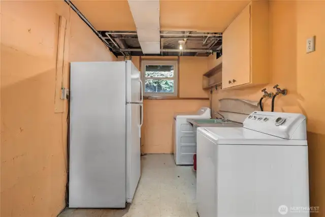 Reconfigure the laundry room and adjacent 1/2 bath into another full bath!