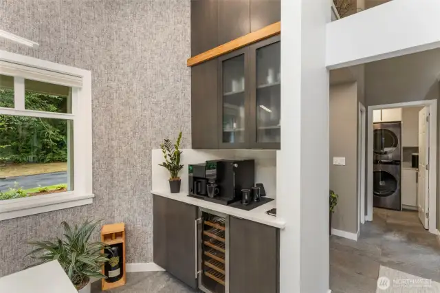 Morning coffee or happy hour? This unique nook with wine refrigerator keeps everything close at hand.