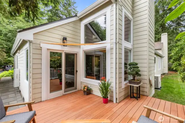 Take time to relax on this fabulous deck, featuring composite decking and surrounded by nature. HOA dues include landscape maintenance!