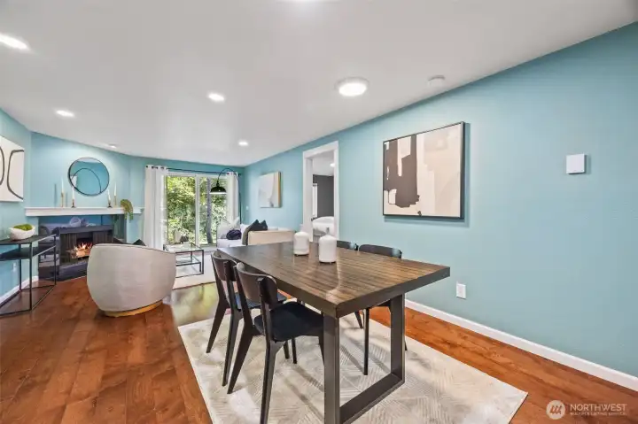 Spacious dining area flows seamlessly between kitchen and living room