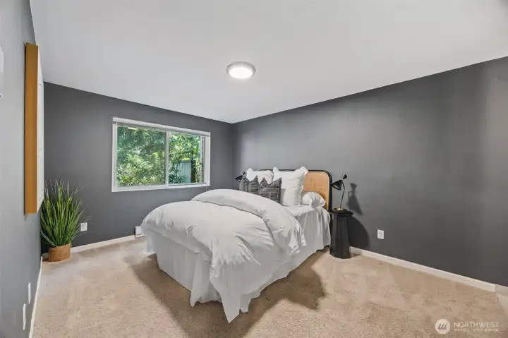 Comfortable bedroom space with fresh, modern finishes