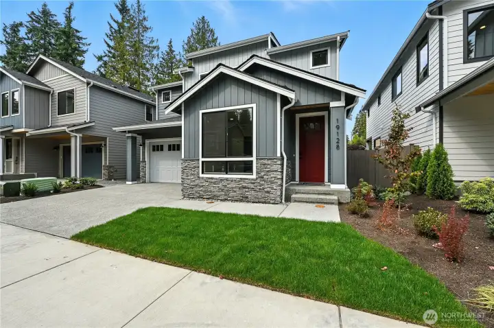photo of  completed home on another lot.