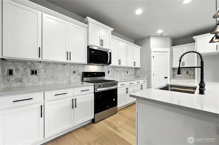 photo of  completed home on another lot.