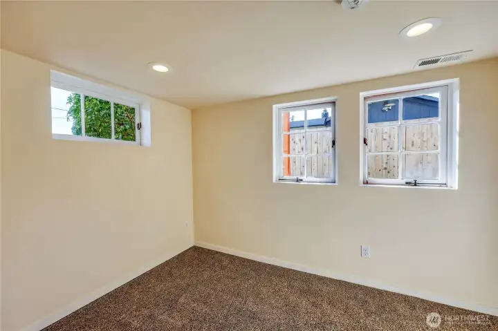 Light filled bedroom downstairs.
