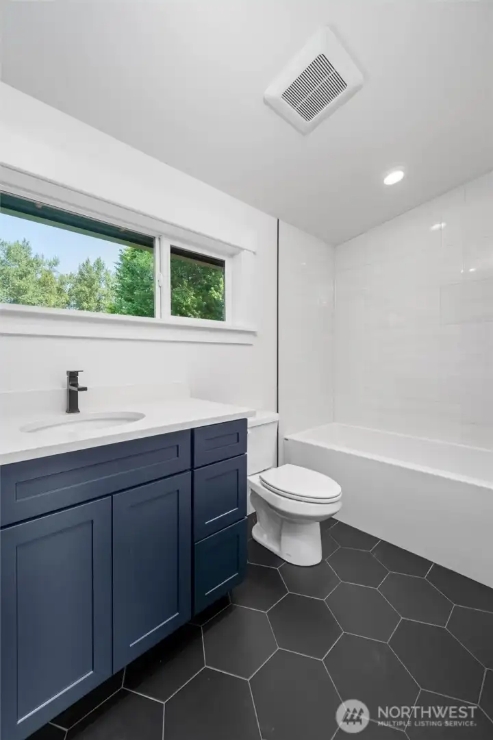Upstairs private bath with in-floor heating.