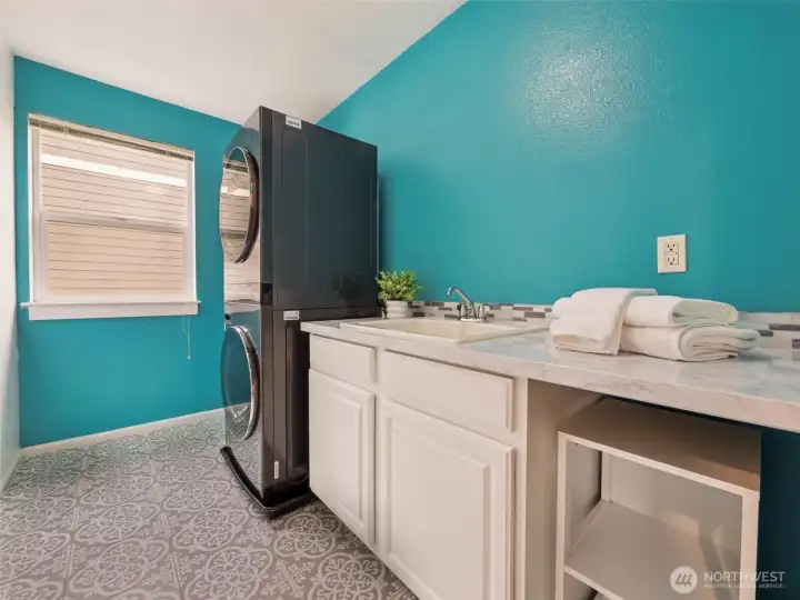 Laundry room with utility sink, upstairs