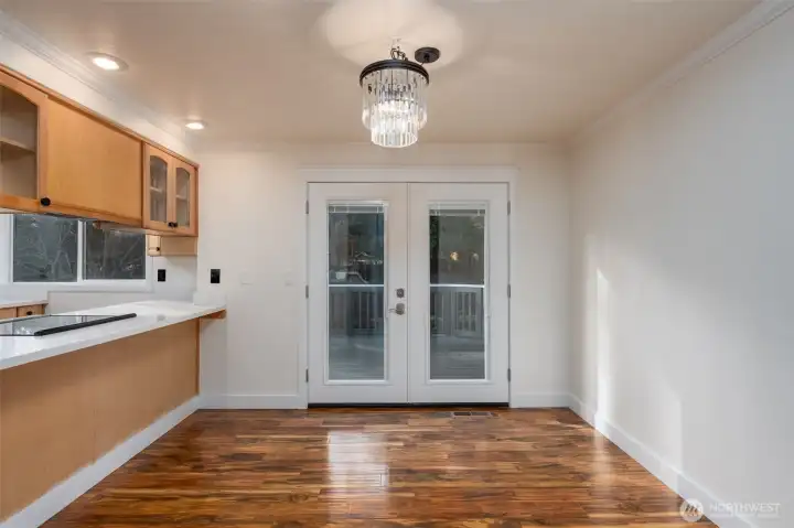 French doors open to oversized decks, creating a wonderful outdoor living space.