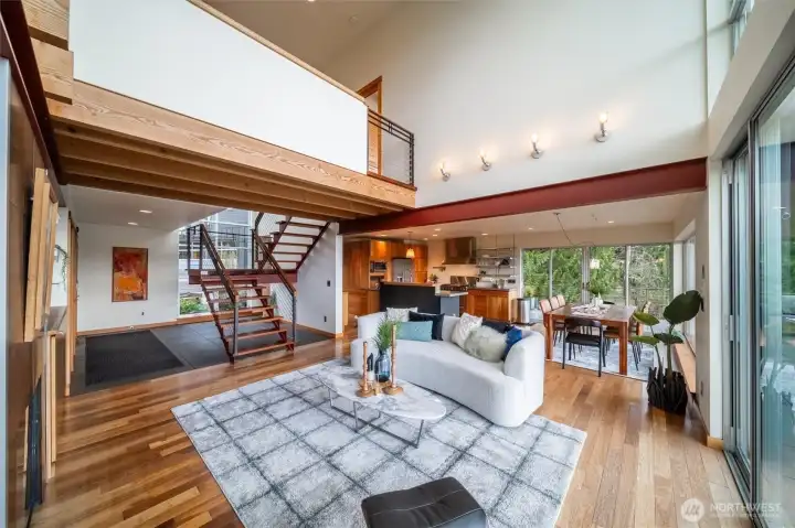 This stunning contemporary design utilized modern architecture while playing with older exposed beam-work for the lofted space. The striking staircase is a functional sculptured centerpiece with Kemas hardwoods inlaid with walnut.