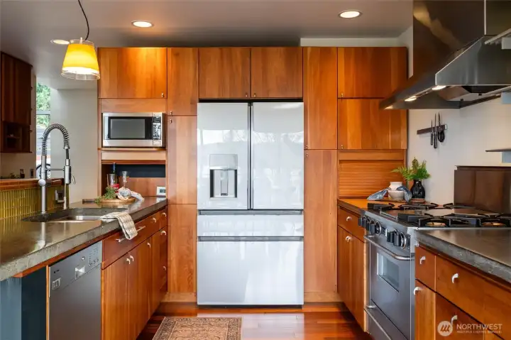 The chefs kitchen with not disappoint from its thoughtful use of space to the pro-grade appliances. Miele dishwasher, Cafe backlit refrigerator, 5 star gas range, on-demand hot water, and professional vent hood.