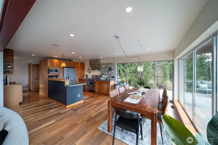 The deck wraps around this space for entertaining, and behind the kitchen your BBQ is plumbed into the natural gas for convenience.