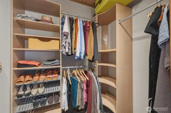 Double walk-in closets mirror each other on the way to the generous ensuite.