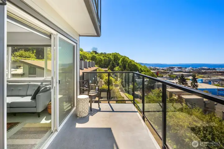 Generous deck perfect for relaxing and enjoying the breeze and views