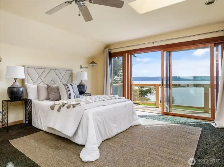 Upper level primary retreat with slider to upper deck