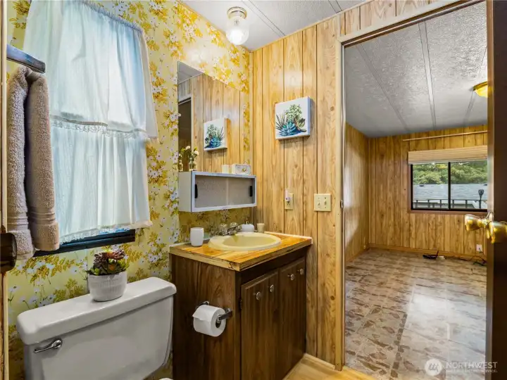 The second bedroom has a half bathroom that gives your guests easy access and privacy.