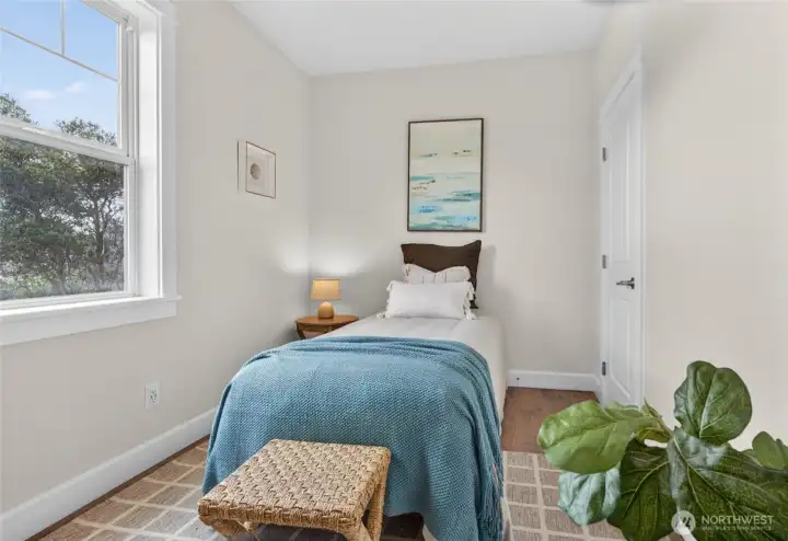 Bright guest bedroom with coastal decor