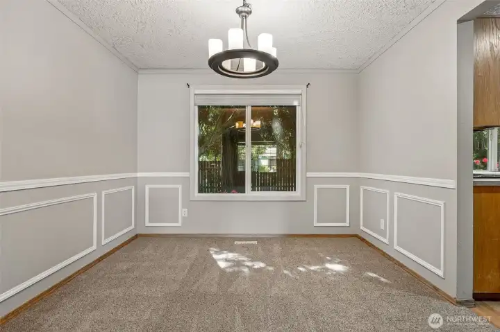 Formal dining room just off the kitchen.