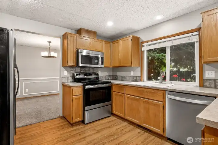 Open kitchen with great storage.