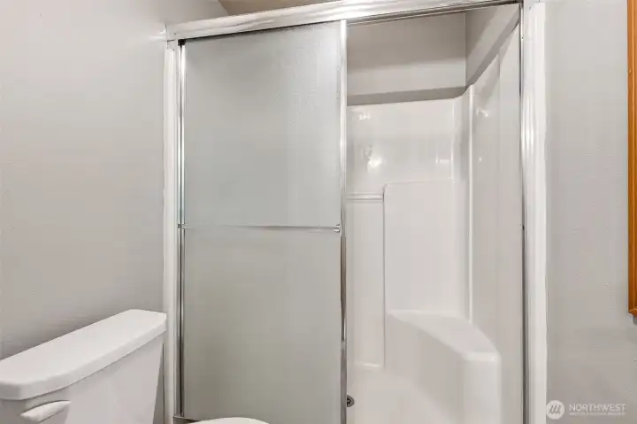 Step in shower in the water closet for added privacy.