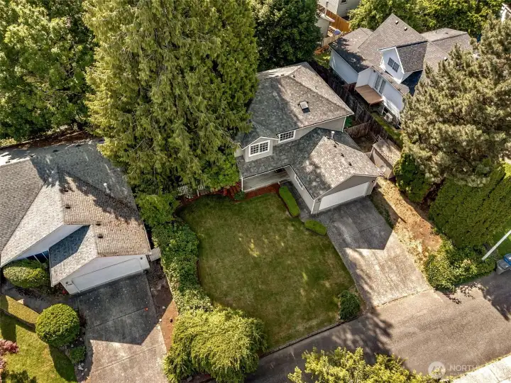 Mature trees and landscape offer a natural private setting.