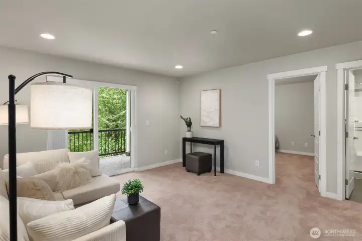 Lower level family room with 4th bedroom, bath and private, covered deck overlooking the protected greenbelt