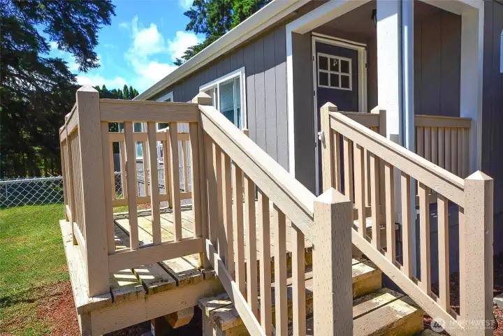 Charming front porch, perfect for enjoying your morning coffee or relaxing in the evening.