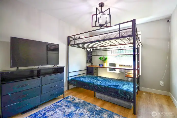 Inviting children’s bedroom with a warm, welcoming feel and functional space