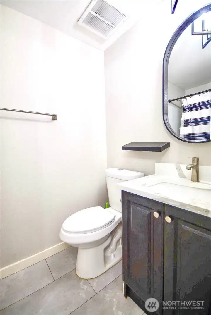 Conveniently located bathroom with tasteful updates and a fresh, contemporary feel