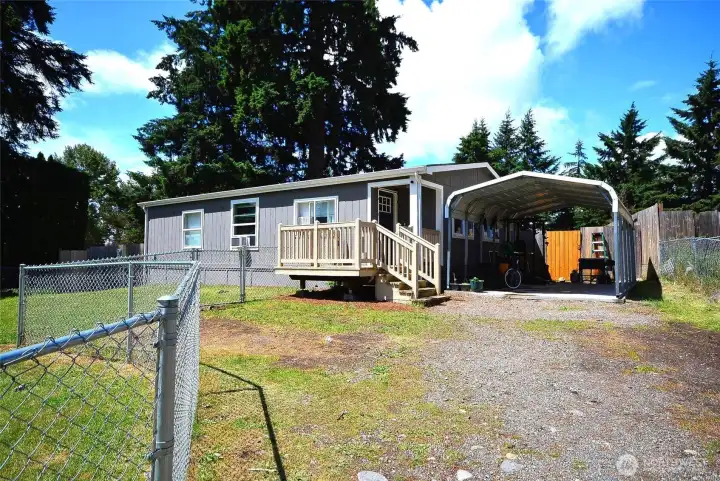 Inviting front view of the home featuring a charming entryway and updated exterior finishes