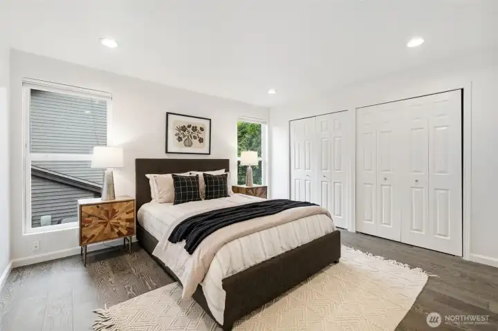 Primary bedroom staged with a Queen bed (upper level) Primary bedroom staged with a Queen bed (upper level)