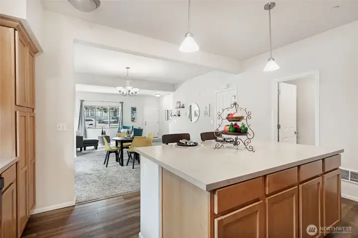 Open-Concept, view from kitchen to dining and living rooms. Open-Concept, view from kitchen to dining and living rooms.