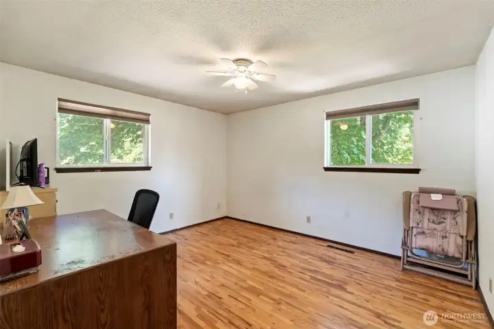 Bedroom 1 with original hardwood floors Bedroom 1 with original hardwood floors