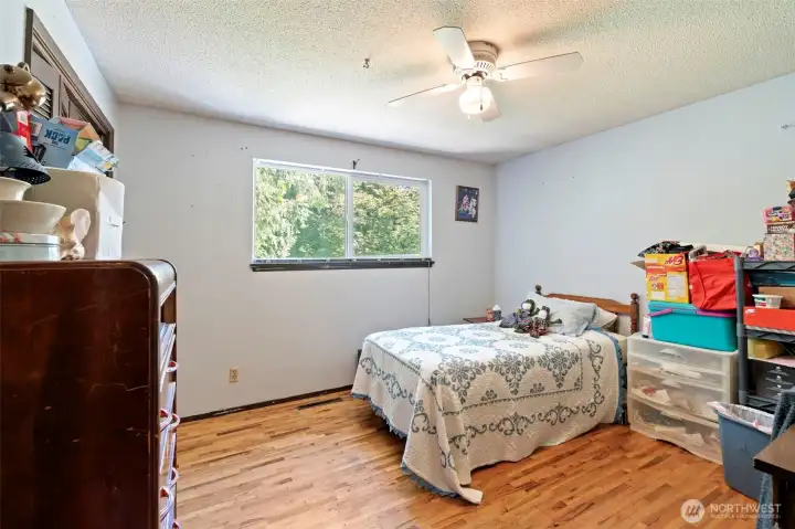 Bedroom 2 with original hardwood floors Bedroom 2 with original hardwood floors