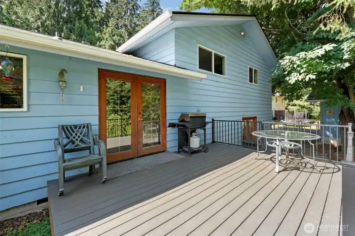 French doors from kitchen leading to trex deck. French doors from kitchen leading to trex deck.