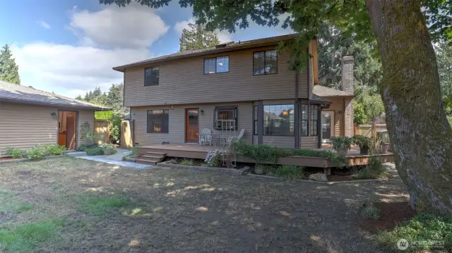 Your dream backyard awaits! A perfect balance of spacious deck areas and level grass—ideal for outdoor entertaining or relaxing.