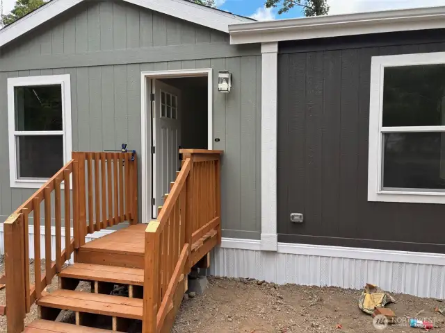 Front view of entry with porch.