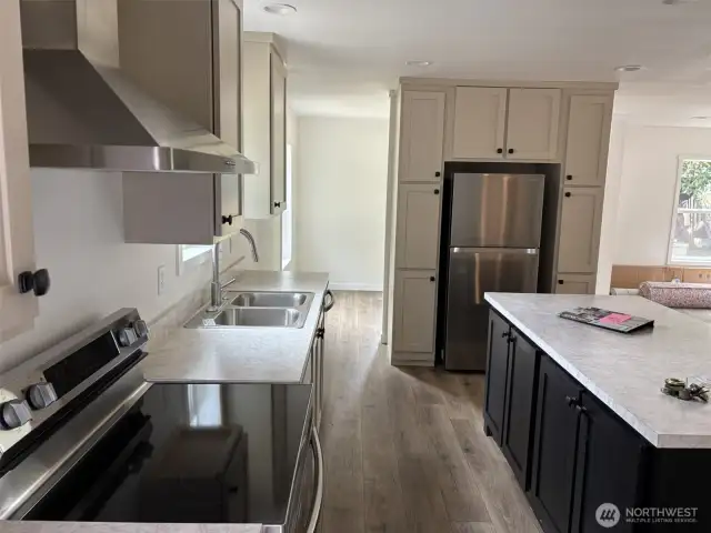 Kitchen with stainless appliances.