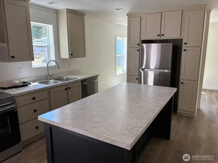 Kitchen with stainless appliances.