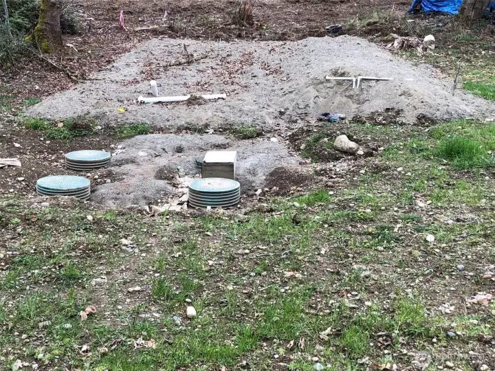 Septic system being installed.