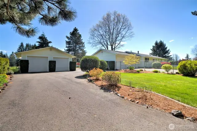 Detached 2-car garage with potential for ADU.