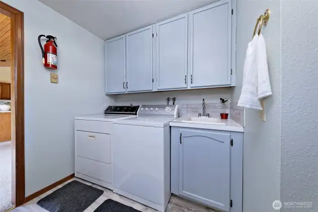 Mudroom/Laundry room. Washer and dryer stay with home.