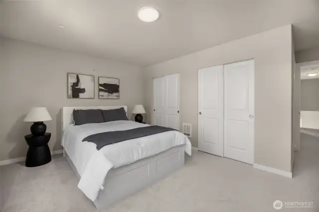 Spacious primary bedroom has 2 closets