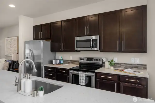Plenty of cabitnet space in kitchen