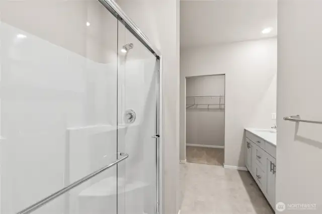 Sizable shower with two seats.