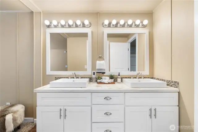 Double vanity, large closet space, and seperate shower room.
