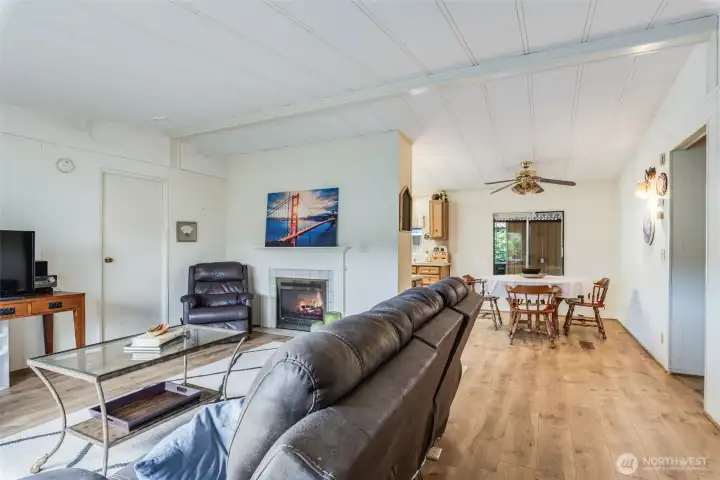 Spacious, open living room with a propane fireplace for warmth and comfort all year.