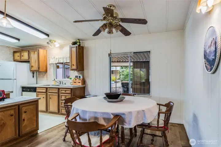 Open kitchen-to-dining layout keeps mealtime and conversation comfortable and connected.