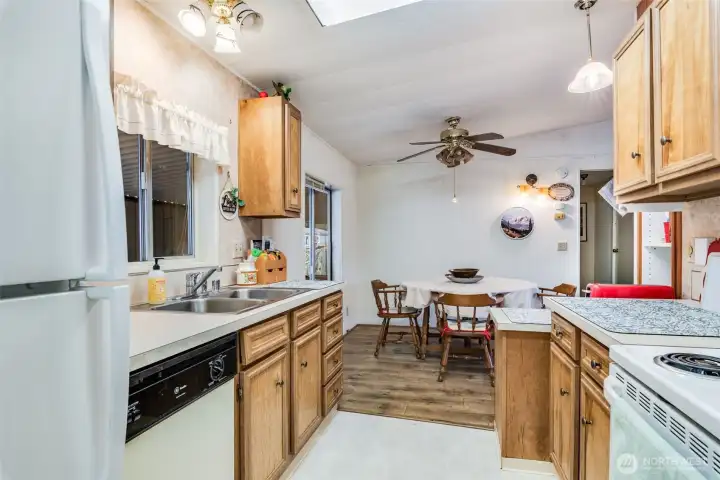 Kitchen sink with a window above brings in natural light for a pleasant workspace.