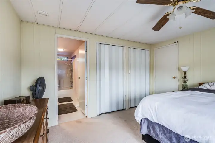 The large closet provides ample storage, keeping everything neatly within reach.
