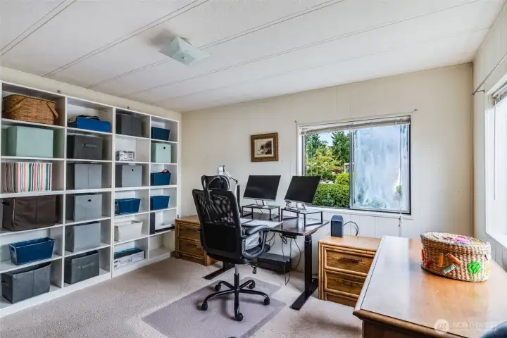 Wall-to-wall shelving keeps everything organized and within easy reach.
